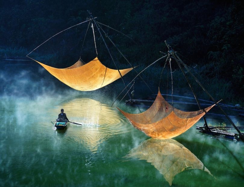 Checking fishing net in Vietnam. Photograph: Hoang Long Ly /Courtesy of Atkins CIWEM Environmental Photographer of the Year